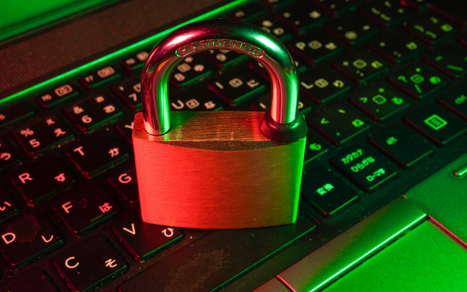A padlock resting on a laptop keyboard